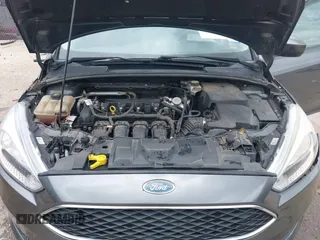 2018 Ford Focus SE z VIN 1FADP3F23JL321768, wystawiony jako IAAI lot #42415788 z przebiegiem 124 126 mil mil oraz . Historia ofert i sprzedaży dostępna na DreamBid. Obrazek 10.