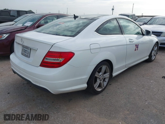 2015 Mercedes-Benz C 250 with VIN WDDGJ4HB9FG370183, listed as a IAAI auction lot 42670705 with 127,582 mi miles and . Bid and sale history available at DreamBid. Image 4.