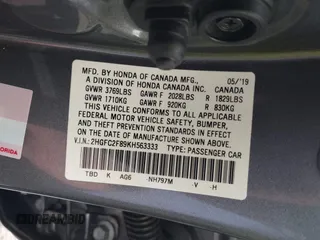 2019 Honda Civic Sport with VIN 2HGFC2F89KH563333, listed as a IAAI auction lot 41959217 with 66,068 mi miles and . Bid and sale history available at DreamBid. Image 9.