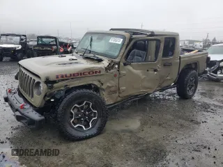 2020 Jeep Gladiator Rubicon with VIN 1C6JJTBGXLL195127, listed as a Copart auction lot 87085074 with 94,362 mi miles and Salvage Title. Bid and sale history available at DreamBid. Image 1.