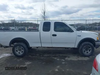 1999 Ford F-150 с VIN 1FTRX18W2XNB30523, выставлен на аукционе IAAI как лот 41617531 с пробегом 319 673 миль миль и . История ставок и продаж доступна на DreamBid. Изображение 13.