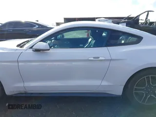 2021 Ford Mustang EcoBoost with VIN 1FA6P8TH6M5105467, listed as a IAAI auction lot 41732934 with 69,287 mi miles. Bid and sale history available at carsss.com. Image 14.