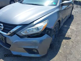 2016 Nissan Altima SR with VIN 1N4AL3AP1GC204037, listed as a IAAI auction lot 42558701 with 82,002 mi miles and . Bid and sale history available at DreamBid. Image 6.