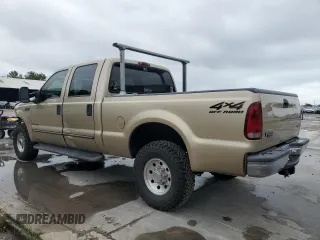 2000 Ford F-250 XL with VIN 1FTNW21F8YED04548, listed as a Copart auction lot 53504655 with 237,741 mi miles and Salvage title. Bid and sale history available at DreamBid. Image 2.