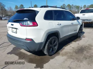 2019 Jeep Cherokee Latitude Plus with VIN 1C4PJLLB2KD296144, listed as a IAAI auction lot 41681051 with 199,698 mi miles and . Bid and sale history available at DreamBid. Image 4.
