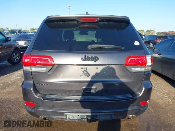 2015 Jeep Grand Cherokee Laredo with VIN 1C4RJFAGXFC631123, listed as a IAAI auction lot 41859251 with 201,558 mi miles. Bid and sale history available at carsss.com. Image 16.