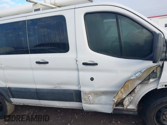 2015 Ford Transit Cargo with VIN 1FTNR1ZMXFKA38419, listed as a IAAI auction lot 41216802 with 109,744 mi miles and . Bid and sale history available at DreamBid. Image 12.
