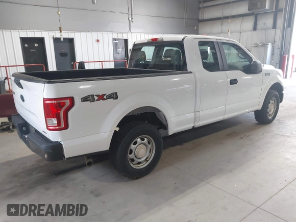 2015 Ford F-150 XLT with VIN 1FTFX1EF3FKD59476, listed as a IAAI auction lot 42622270 with 201,039 mi miles and . Bid and sale history available at DreamBid. Image 4.