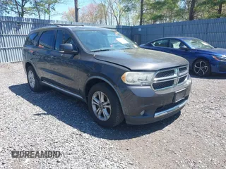 2011 Dodge Durango Crew with VIN 1D4SE4GT6BC664597, listed as a IAAI auction lot 42142568 with 202,275 mi miles and . Bid and sale history available at carsss.com. Image 1.