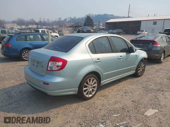 2009 Suzuki SX4 Sport FWD z VIN JS2YC414996201530, wystawiony jako IAAI lot #41476333 z przebiegiem 148 263 mil mil oraz . Historia ofert i sprzedaży dostępna na DreamBid. Obrazek 4.