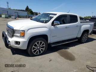 2017 GMC Canyon 4WD Denali z VIN 1GTG6EEN5H1308429, wystawiony jako Copart lot #56491935 z przebiegiem 92 122 mil mil oraz Szkoda całkowita • Salvage title. Historia ofert i sprzedaży dostępna na DreamBid. Obrazek 1.