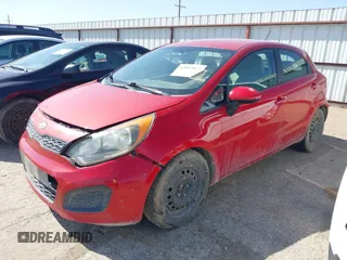 2012 Kia Rio LX with VIN KNADM5A35C6058809, listed as a IAAI auction lot 42052025 with 124,266 mi miles. Bid and sale history available at carsss.com. Image 2.