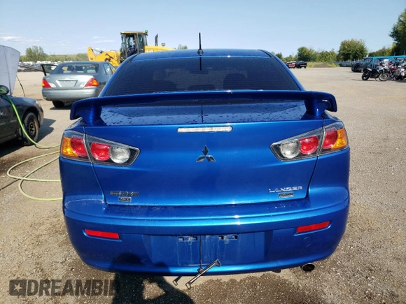 2015 Mitsubishi Lancer SE with VIN JA32V2FW3FU606202, listed as a Copart auction lot 70142394 with 129,336 mi miles and Salvage Title. Bid and sale history available at carsss.com. Image 6.
