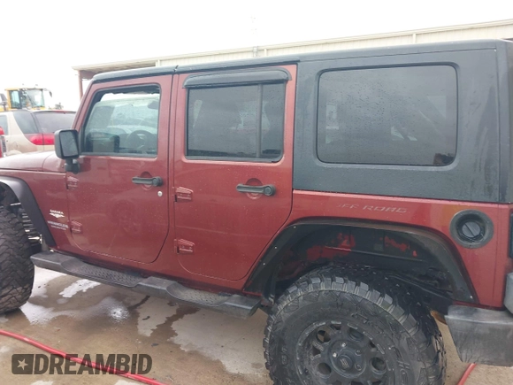 2007 Jeep Wrangler Unlimited Sahara with VIN 1J4GB59197L142223, listed as a IAAI auction lot 42025639 with 155,274 mi miles and . Bid and sale history available at DreamBid. Image 14.