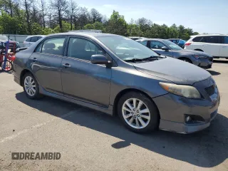 2010 Toyota Corolla with VIN 2T1BU4EE5AC242671, listed as a Copart auction lot 61998285 with 210,290 mi miles and Clean title. Bid and sale history available at DreamBid. Image 4.