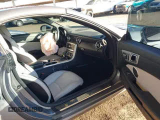 2013 Mercedes-Benz SLK-Class SLK 250 with VIN WDDPK4HA9DF058128, listed as a IAAI auction lot 41809272 with 76,860 mi miles. Bid and sale history available at carsss.com. Image 5.