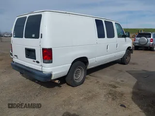 2012 Ford Econoline Cargo Commercial with VIN 1FTNE1EW0CDB06455, listed as a IAAI auction lot 41666172 with 270,816 mi miles and . Bid and sale history available at carsss.com. Image 4.