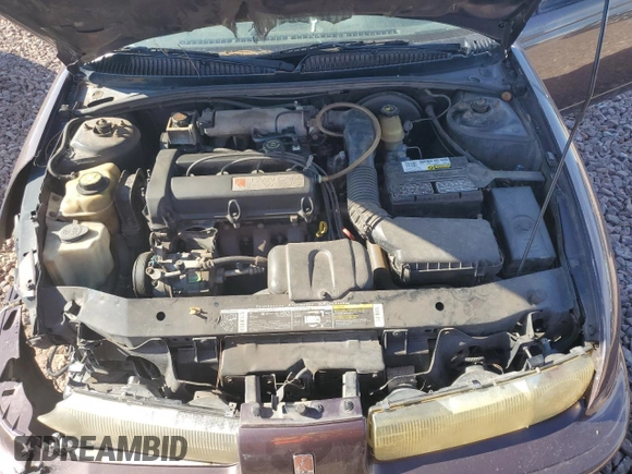 1999 Saturn SL with VIN 1G8ZK527XXZ136922, listed as a Copart auction lot 86704404 with 134,897 mi miles and Salvage Title. Bid and sale history available at carsss.com. Image 11.