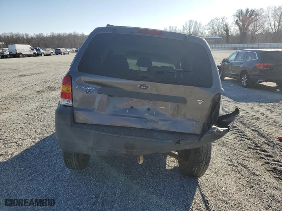 2006 Ford Escape XLT with VIN 1FMCU03186KA77066, listed as a Copart auction lot 48992595 with 194,629 mi miles and Salvage Title. Bid and sale history available at carsss.com. Image 6.