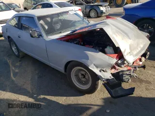 1983 Datsun 280ZX 2+2 z VIN JN1HZ06S2DX506351, wystawiony jako Copart lot #74302484 z przebiegiem 17 211 mil mil oraz Szkody całkowita. Historia ofert i sprzedaży dostępna na DreamBid. Obrazek 4.