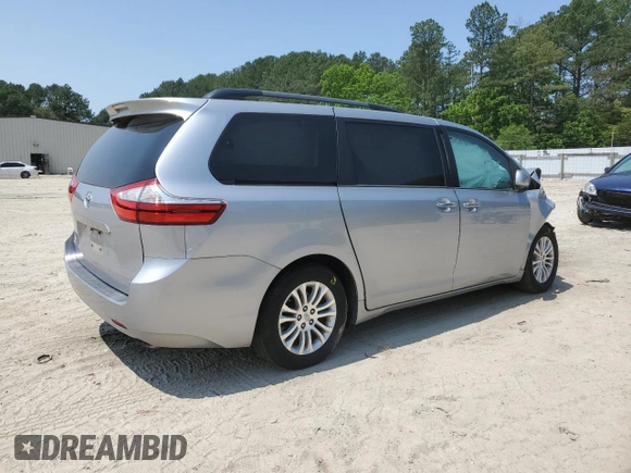 2015 Toyota Sienna XLE with VIN 5TDYK3DC9FS559460, listed as a Copart auction lot 59599405 with Not provided miles and Salvage title. Bid and sale history available at DreamBid. Image 3.