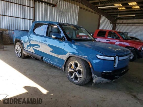 2022 Rivian R1T Adventure Package with VIN 7FCTGAAA8NN014044, listed as a Copart auction lot 49919865 with 0 mi miles and Salvage Title. Bid and sale history available at carsss.com. Image 4.