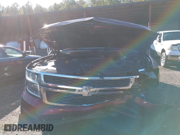 2017 Chevrolet Suburban LT with VIN 1GNSKHKC3HR311901, listed as a IAAI auction lot 40883429 with 141,325 mi miles. Bid and sale history available at carsss.com. Image 6.