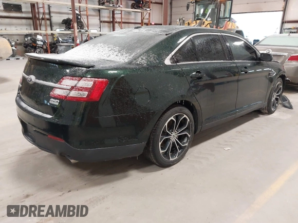 2013 Ford Taurus SHO z VIN 1FAHP2KT8DG142620, wystawiony jako IAAI lot #41800583 z przebiegiem 175 812 mil mil oraz . Historia ofert i sprzedaży dostępna na DreamBid. Obrazek 4.