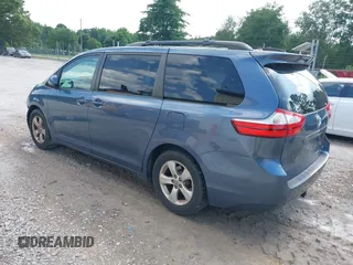 2015 Toyota Sienna LE AAS with VIN 5TDKK3DCXFS624984, listed as a IAAI auction lot 42560632 with 169,034 mi miles and . Bid and sale history available at DreamBid. Image 3.