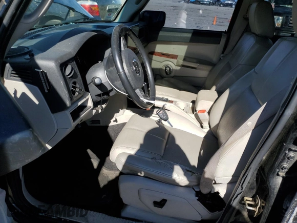2007 Jeep Commander Limited with VIN 1J8HG58237C565698, listed as a Copart auction lot 56632065 with 171,000 mi miles and Clean title. Bid and sale history available at DreamBid. Image 7.