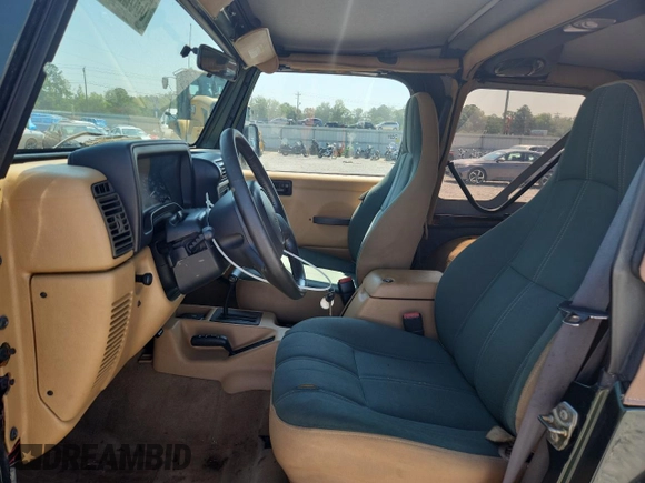 1997 Jeep Wrangler Sahara with VIN 1J4FY49S3VP519387, listed as a Copart auction lot 63822395 with 187,884 mi miles and Salvage title. Bid and sale history available at DreamBid. Image 7.