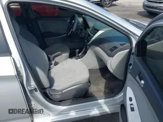 2014 Hyundai Accent GLS with VIN KMHCT4AE9EU688954, listed as a IAAI auction lot 42141664 with 99,041 mi miles. Bid and sale history available at carsss.com. Image 5.
