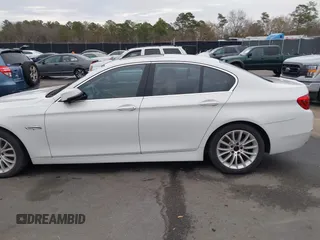 2015 BMW 5 Series 528i with VIN WBA5A5C5XFD516999, listed as a IAAI auction lot 41195184 with 131,187 mi miles. Bid and sale history available at carsss.com. Image 13.