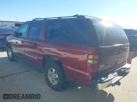 2002 Chevrolet Suburban LT with VIN 1GNEC16Z02J229078, listed as a IAAI auction lot 41737482 with 306,502 mi miles and . Bid and sale history available at DreamBid. Image 3.