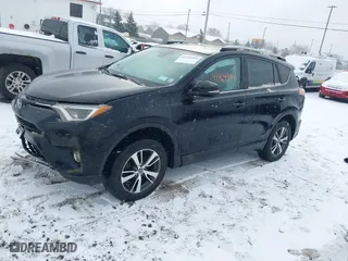 2018 Toyota RAV4 XLE with VIN 2T3RFREV8JW851250, listed as a IAAI auction lot 41164994 with 63,005 mi miles. Bid and sale history available at carsss.com. Image 17.