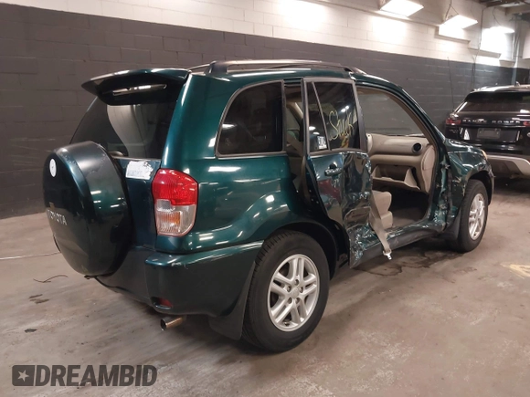 2003 Toyota RAV4 with VIN JTEGH20V130114281, listed as a IAAI auction lot 42144334 with 82,134 mi miles and . Bid and sale history available at carsss.com. Image 4.