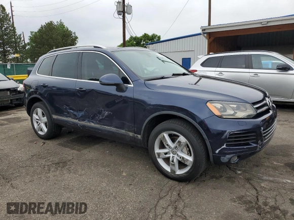 2011 Volkswagen Touareg Lux z VIN WVGFK9BP4BD001551, wystawiony jako Copart lot #58743065 z przebiegiem 142 661 mil mil oraz Szkoda całkowita • Salvage title. Historia ofert i sprzedaży dostępna na DreamBid. Obrazek 4.
