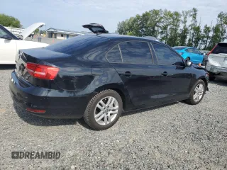 2015 Volkswagen Jetta S with VIN 3VW2K7AJ4FM247804, listed as a Copart auction lot 60654995 with Not provided miles and Salvage title. Bid and sale history available at DreamBid. Image 3.
