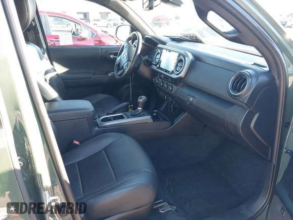 2021 Toyota Tacoma SR with VIN 3TMCZ5AN7MM395940, listed as a IAAI auction lot 41240832 with 39,338 mi miles and . Bid and sale history available at DreamBid. Image 5.