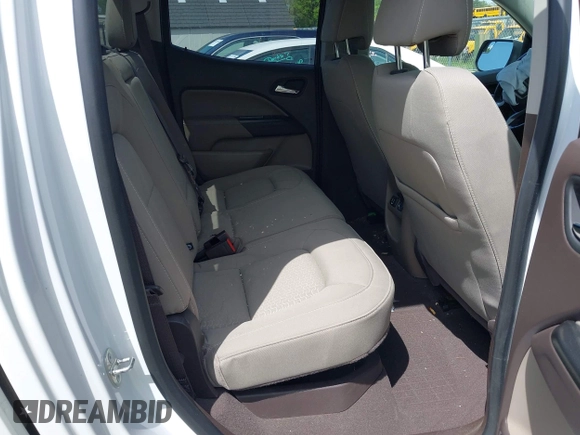 2019 GMC Canyon 4WD SLE z VIN 1GTG6CENXK1319647, wystawiony jako IAAI lot #42039568 z przebiegiem 56 371 mil mil oraz . Historia ofert i sprzedaży dostępna na DreamBid. Obrazek 8.