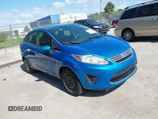 2012 Ford Fiesta SE z VIN 3FADP4BJ5CM156617, wystawiony jako IAAI lot #42520455 z przebiegiem 180 266 mil mil oraz . Historia ofert i sprzedaży dostępna na DreamBid. Obrazek 1.