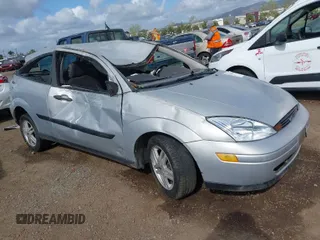 2000 Ford Focus ZX3 with VIN 3FAFP3139YR210307, listed as a IAAI auction lot 41946264 with 215,233 mi miles and . Bid and sale history available at DreamBid. Image 1.