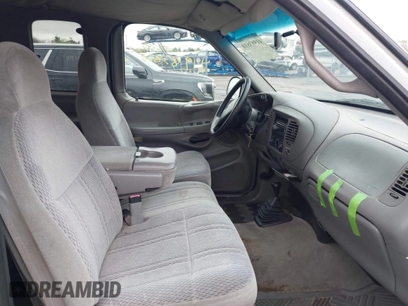 1998 Ford F-150 XL with VIN 2FTRX08L1WCB04886, listed as a IAAI auction lot 41983810 with 185,909 mi miles and . Bid and sale history available at DreamBid. Image 5.