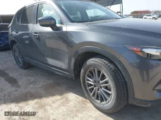 2019 Mazda CX-5 Touring with VIN JM3KFACMXK0686957, listed as a IAAI auction lot 41720338 with 95,421 mi miles. Bid and sale history available at carsss.com. Image 6.