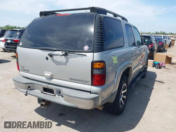 2005 Chevrolet Tahoe Z71 with VIN 1GNEC13T65R162332, listed as a IAAI auction lot 42058892 with 271,775 mi miles and . Bid and sale history available at DreamBid. Image 4.