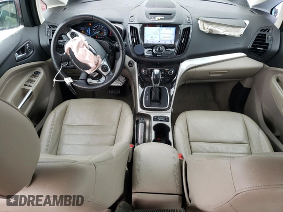 2016 Ford C-Max Energi SEL with VIN 1FADP5CU8GL119986, listed as a Copart auction lot 82677273 with 64,021 mi miles. Bid and sale history available at carsss.com. Image 8.