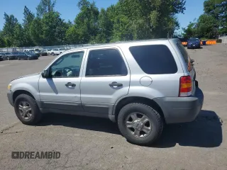 2005 Ford Escape XLS Value with VIN 1FMYU92Z55KC93604, listed as a Copart auction lot 60104145 with 86,788 mi miles and Salvage title. Bid and sale history available at DreamBid. Image 2.