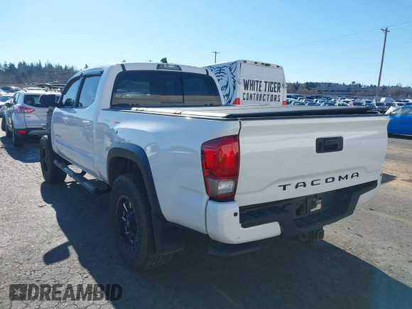 2017 Toyota Tacoma SR5 with VIN 3TMDZ5BN3HM023813, listed as a IAAI auction lot 41522828 with 128,533 mi miles and . Bid and sale history available at DreamBid. Image 3.