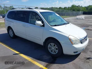2012 Kia Sedona LX with VIN KNDMG4C71C6447550, listed as a IAAI auction lot 42190357 with 161,960 mi miles. Bid and sale history available at carsss.com. Image 1.