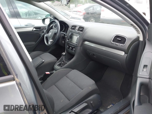 2012 Volkswagen Golf TDI with VIN WVWNM7AJ8CW139028, listed as a IAAI auction lot 42421116 with 60,776 mi miles and . Bid and sale history available at DreamBid. Image 5.